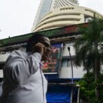 Sensex, Nifty open flat tracking mixed global signals
