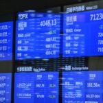 Stocks wobble as bonds slump to monthly loss