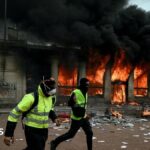 Violent clashes, looting and buildings ablaze as hundreds arrested after France protests