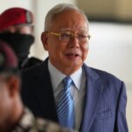 Malaysia still deep in 1MDB red as Najib heads home