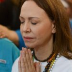 Venezuela opposition leader Machado returns home after fraught year in exile