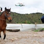 Residents airlifted to safety after flooding in central Chile
