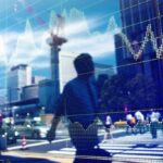 Stocks trade cautiously in Asia, Brent off six-month top