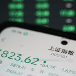 Asian shares track Wall Street higher, Treasury yields near multi-decade highs