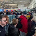 Long queues after power surge at Stansted Airport