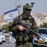 Five Israelis wounded and two suspected Palestinian attackers killed in West Bank shooting