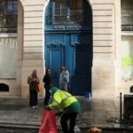 Riot-ravaged luxury stores in Paris fear more mayhem, looting