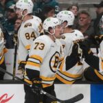 McAvoy scores in his 1st game back from a suspension to lead the Bruins past the Sharks 6-3