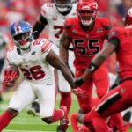 Singletary's 30-yard run in OT gives Giants 27-21 win over Texans