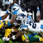 Packers' Watson goes to hospital with chest injury in 2nd quarter. Then he returns to the game.