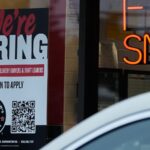 Americans filing for jobless aid remain at historically low levels below 200,000
