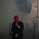 Clashes break out at France’s Halloween protests, as hundreds of thousands take to streets